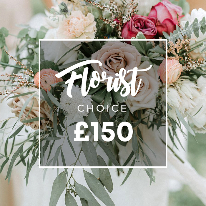 Soft-focus beauty meets modern romance in this lavish hand-tied bouquet, dominated by pale pink and creamy white roses with tightly furled petals, mingling with ruffled peach ranunculus and touches of deeper fuchsia or burgundy. Smaller white textured blooms-chrysanthemums or similar-pepper the arrangement, while lush eucalyptus leaves in dusty-green and silvery-green stems provide air and shine. The bouquet's structure is loose and organic, as if freshly gathered from a cottage garden, yet executed with couture polish for a wedding or luxe gift. Centered over the bouquet is a semi-transparent white square overlay bearing 'Florist Choice': 'Florist' in an elegant script and 'CHOICE' in uppercase beneath, with the price ?150 in bold sans-serif text. The soft, blurred background evokes a bridal gown or draped fabric, keeping attention on form, colour, and texture. Locally, this design is a refined option for celebrations near Forest Gate, including Wanstead, Stratford, and Green Street, available with same-day delivery from Flower Delivery Forest Gate.